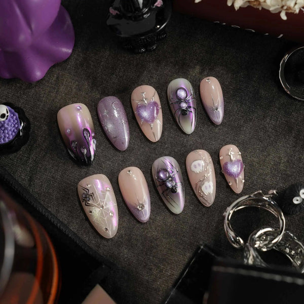 Halloween purple nails with 3D spider and chrome finish