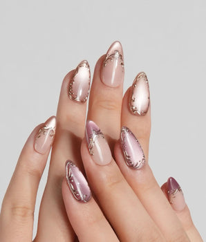 Caramel Petal press-on nails with mauve rose chrome French tips and gold baroque linework