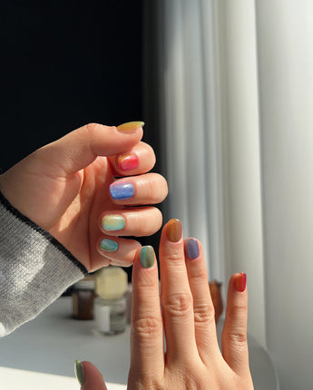 Colored Stone nail art close-up showing Colorful Cat Eye Nails details