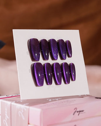 Grape Color Cat-eye press-on nails in medium coffin shape — purple cat eye nails