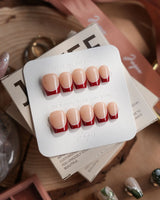 Classic Return - Rose press-ons with deep rose burgundy tips and thin white line detail