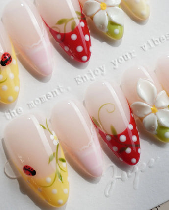 Lucky Dot nail art close-up showing Cute Pastoral, Hand-painted Ladybugs & Red Polka Dot French Tips. details