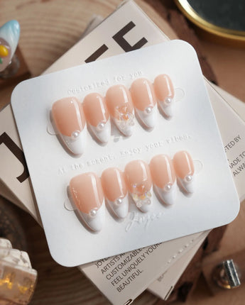 Cute French Tip Nails handmade press-on nails featuring french tip nails with pearls and teddy bear charm