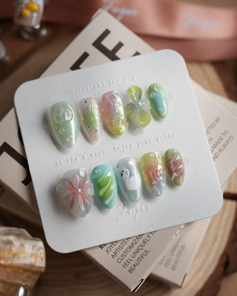 Seaglass Swan city-summer nails with tidal shimmer and pastel sculpted details
