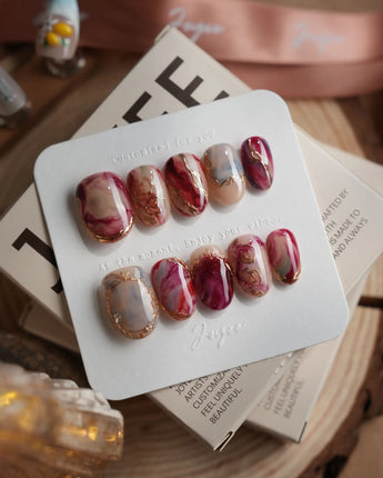 Baroque Palette press-on nails with marble mix design, pink red swirls and rose accents