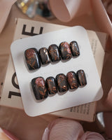 Thorned Spell press-on nails — black cat eye gold outline rose thorn design handmade nail art by Joyee Nails