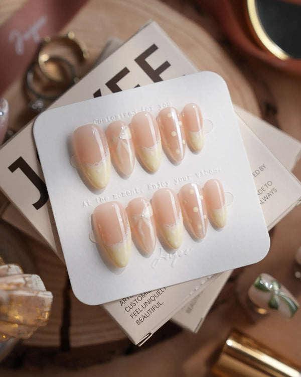 Butter Bow press-on nails — Creamy Soft Yellow, Lace