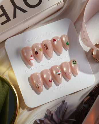 Mini Noel press-on nails — nude cat eye christmas icons handmade nail art by Joyee Nails