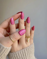 Fuchsia Cat-eye nail art close-up showing Fuchsia Cat eye
 details
