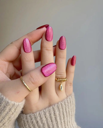 Fuchsia Cat-eye nail art close-up showing Fuchsia Cat eye
 details