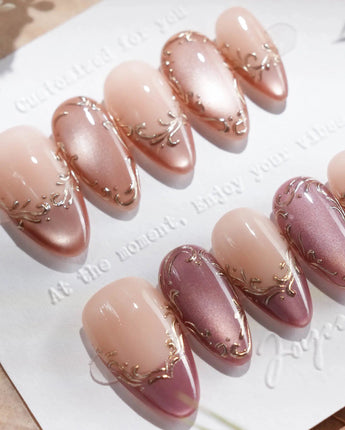 Pink purple cat eye French tips medium almond press on nails with gold accents
