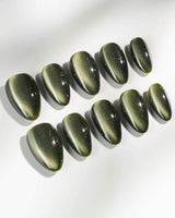 Alga press-on nails in extra short almond shape — Deep Dark Green, Cat Eye Glossy Effect.