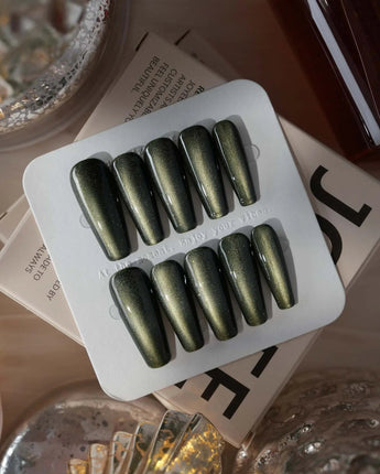 Alga press-on nails in long coffin shape — Deep Dark Green, Cat Eye Glossy Effect.
