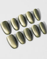 Alga press-on nails in medium oval shape — Deep Dark Green, Cat Eye Glossy Effect.