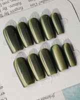 Alga press-on nails in medium square shape — Deep Dark Green, Cat Eye Glossy Effect.