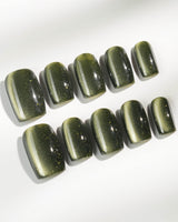 Alga press-on nails in short square shape — Deep Dark Green, Cat Eye Glossy Effect.