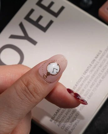 Alice in Wonderland handmade press-on nails in short oval shape by Joyee Nails