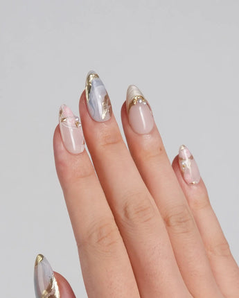 Vintage Mist press-on nails with soft neutral marble, metallic gold foil and elegant pearls