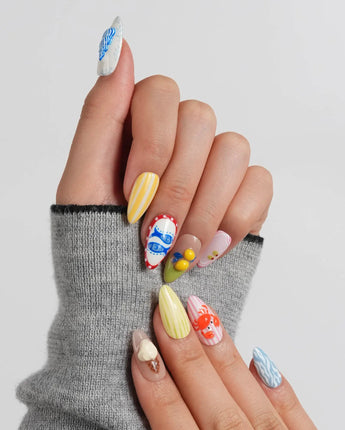 Amalfi Day custom press-on nails with yellow duck float and bright coastal motifs