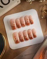Amber Maple press-on nails — orange french tips gold outline maple leaves handmade nail art by Joyee Nails