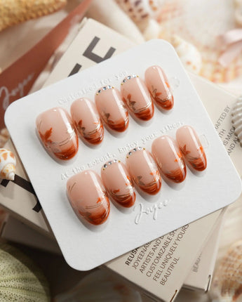 Amber Maple medium oval press-on nails with fall-inspired handmade nail art
