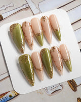 Aquagrass - Liquid Ballerina press-on nails in long stiletto shape — Vintage Olive Green, Embossed Gold Leaves & French Tips.