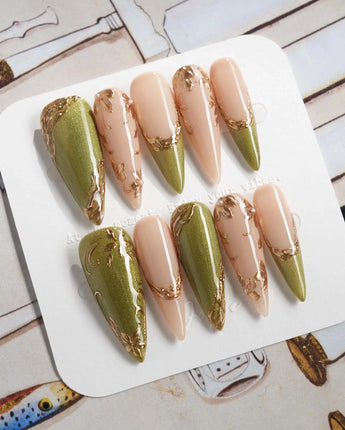 Aquagrass - Liquid Ballerina press-on nails in long stiletto shape — Vintage Olive Green, Embossed Gold Leaves & French Tips.