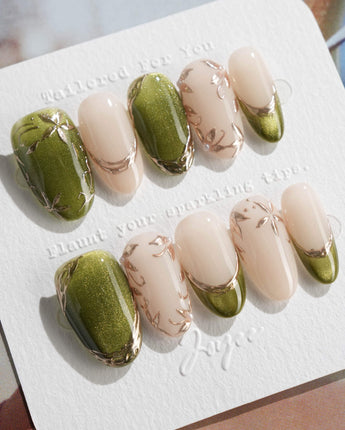 Aquagrass - Liquid Ballerina press-on nails in medium oval shape — Vintage Olive Green, Embossed Gold Leaves & French Tips.