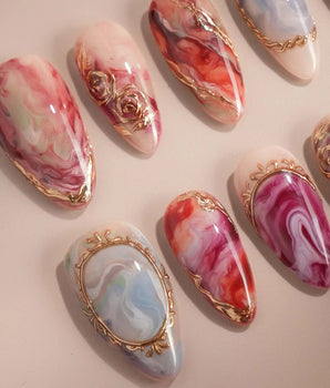 Baroque Palette handmade press-on nails featuring marble mix design pink red blue swirl gold outline rose accents glossy