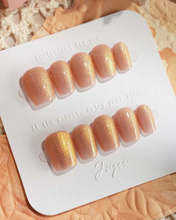 Aurora Flame press-on nails in extra short coffin shape — orange & gold cat eye