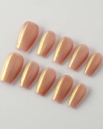 Aurora Flame press-on nails in short coffin shape — orange & gold cat eye