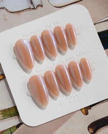 Aurora Icefire press-on nails in medium almond shape — Icy Iridescent Cat Eye.