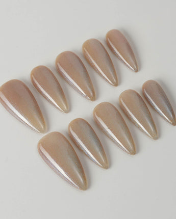 Aurora Icefire press-on nails in medium stiletto shape — Icy Iridescent Cat Eye.