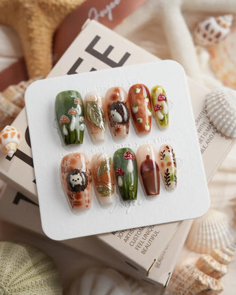 Autumn Tales medium coffin press-on nails with hedgehog, mushroom, and autumn forest details