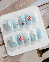 Baby Seals cute ocean nail art with light blue waves and raised gel seal details