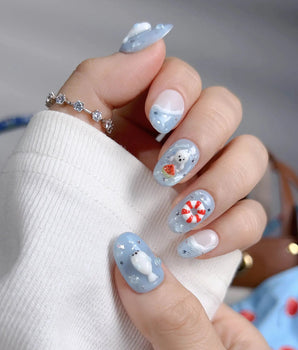 Baby Seals ocean summer press-on nails with sleepy seals and blue wave details
