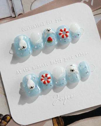 Baby Seals short oval nail art with soft blue waves and hand-sculpted seals