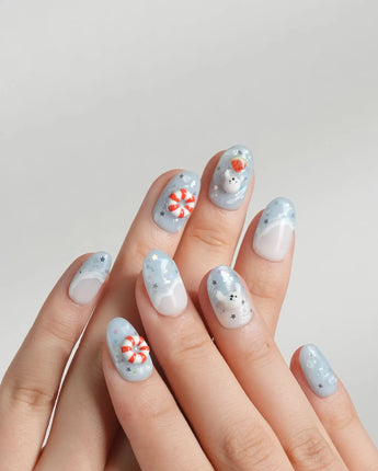 Baby Seals close-up of 3D seal nail art with watermelon and light blue water