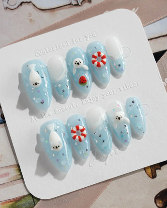 Baby Seals light blue press-on nails with cute seals and glossy water details