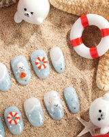 Baby Seals handmade ocean nails with cute seal pups peeking through waves