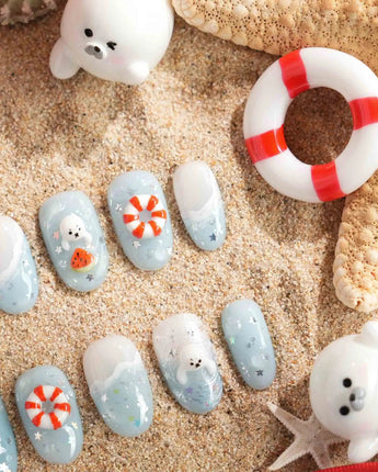 Baby Seals handmade ocean nails with cute seal pups peeking through waves