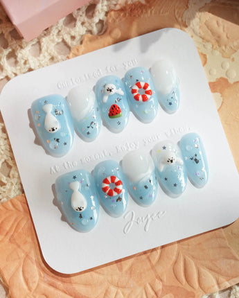 Baby Seals vacation nails with sleepy seals, lifebuoys, and summer wave motifs