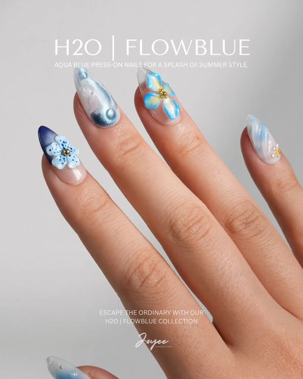 Bali Blue short almond nails with ocean blue jelly shine, 3D flowers, and starfish details