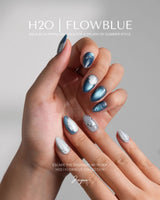 Banff Blue press-on nails in extra short almond shape — Cat Eye Blue Nails with Chrome Outline