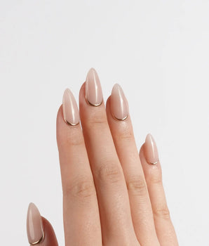 Bare Skin nail art close-up showing Minimalist Nude Chic, Champagne Gold Cuticle Outlines. details