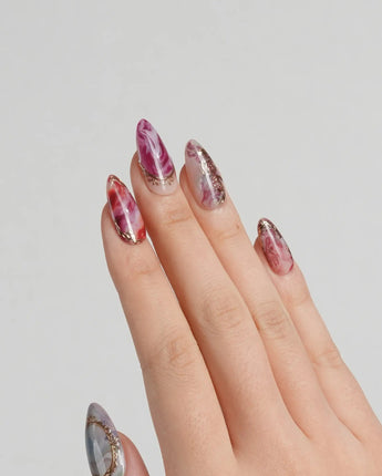 Baroque Palette press-on nails with glossy marble swirls, baroque gold outlines and floral accents