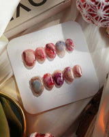 Baroque Palette press-on nails with red marble, rose accents and gold baroque outlines