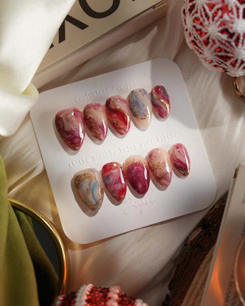 Baroque Palette press-on nails with painterly marble mix and ornate gold line accents