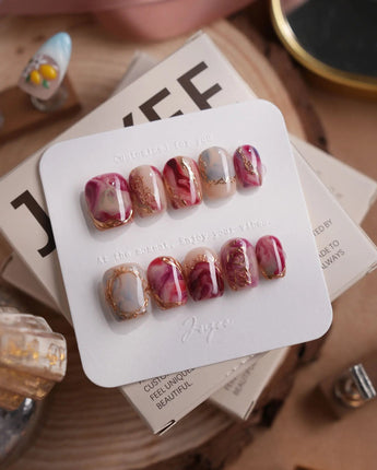 Baroque Palette extra short coffin press-on nails with marble swirls and gold outlines