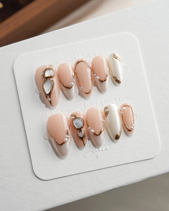 Baroque Pearl custom size press-on nails in medium almond with real pearls and gems